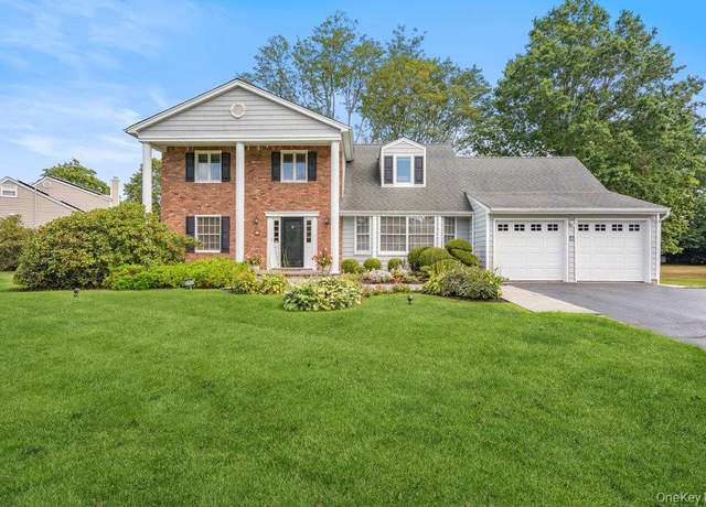 Property at 12 Aron Dr, Woodbury, NY 11797, 4 beds, 2.5 baths
