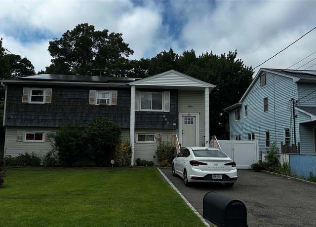 Property at 665 Commander Ave, West Babylon, NY 11704, 5 beds, 2 baths