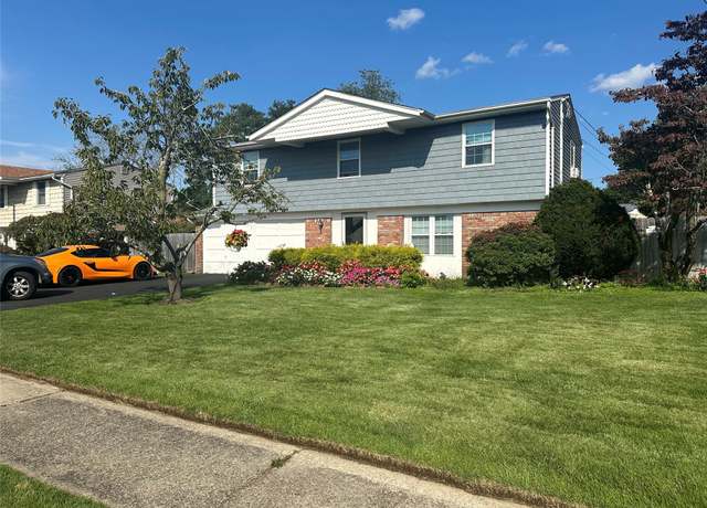 Property at 9 Mosby Dr, Lake Grove, NY 11755, 5 beds, 3.5 baths
