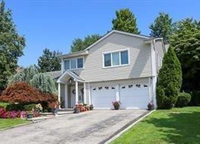 Property at 27 Brookfield Rd, Manhasset Hills, NY 11040, 4 beds, 3 baths