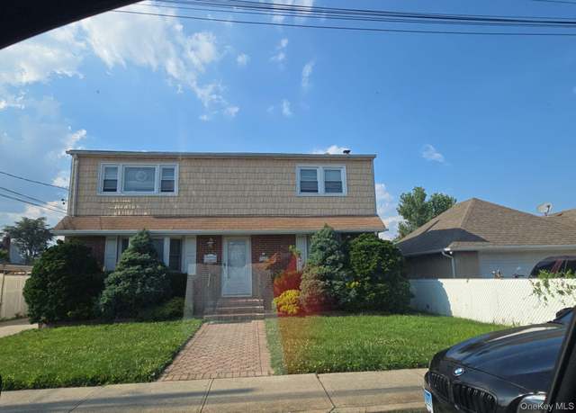 Property at 1314 Globe Ave, Elmont, NY 11003, 4 beds, 2 baths