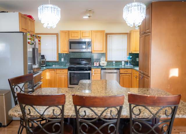 Property at 129 Stewart St, Elmont, NY 11003, 4 beds, 2 baths