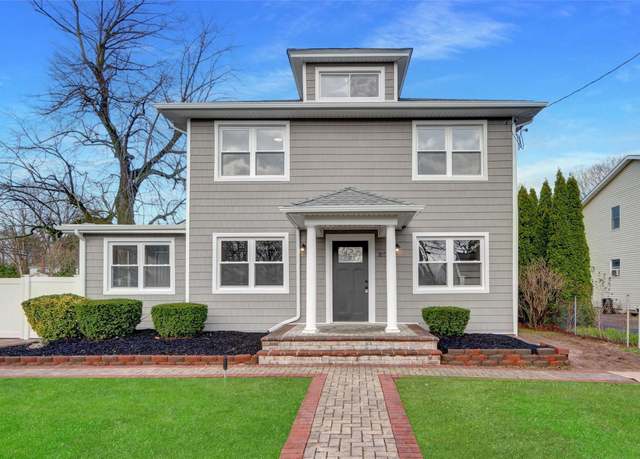 Property at 1050 Ocean Ave, Bohemia, NY 11716, 5 beds, 2 baths