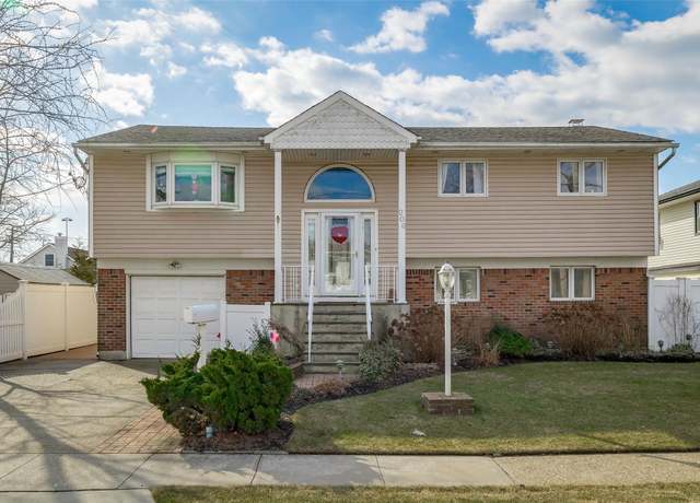 Property at 206 Hamilton Ave, Island Park, NY 11558, 3 beds, 2 baths