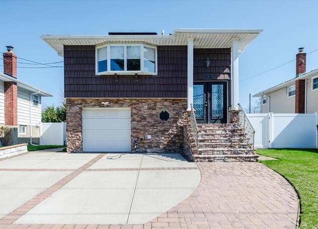 Property at 151 Baker Ct, Island Park, NY 11558, 4 beds, 2 baths