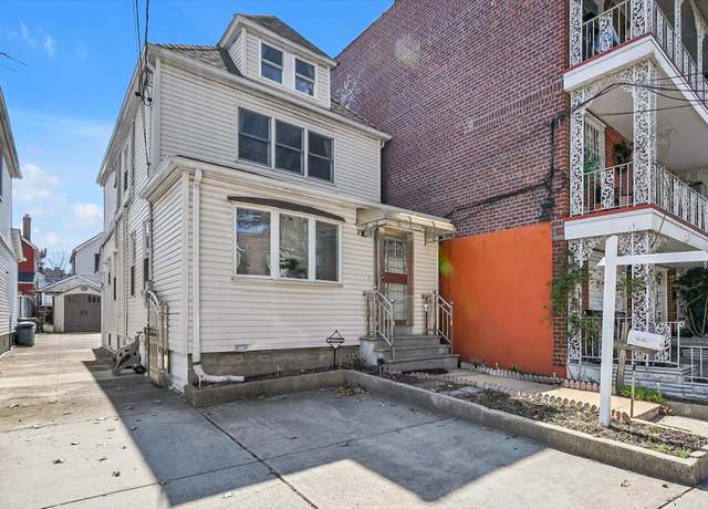 Property at 61-32 Booth St, Rego Park, NY 11374, 3 beds, 2 baths