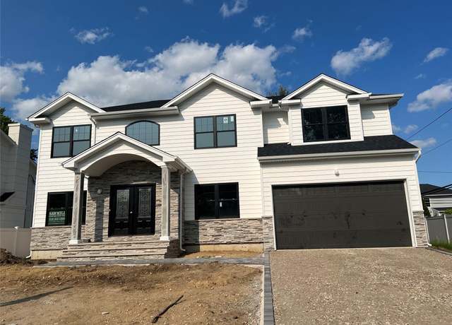 Property at 8 Madison Ave, Jericho, NY 11753, 5 beds, 4.5 baths
