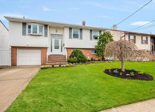 Property at 92 E First St, Freeport, NY 11520, 4 beds, 2 baths