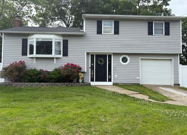 Property at 93 Holiday Park Dr, Centereach, NY 11720, 4 beds, 1.5 baths
