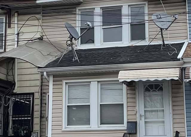 Property at 92-45 75th St, Woodhaven, NY 11421, 3 beds, 2 baths