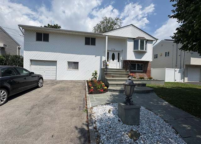 Property at 378 W Waukena Ave, Oceanside, NY 11572, 5 beds, 3 baths