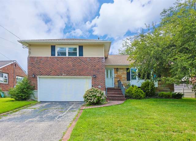 Property at 11 Driftwood Dr, Glen Cove, NY 11542, 3 beds, 2.5 baths