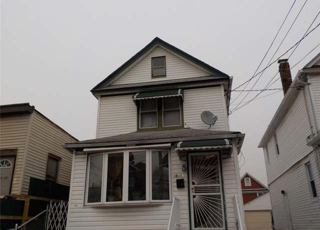 Property at 107-39 156th St, Jamaica, NY 11433, 5 beds, 2 baths