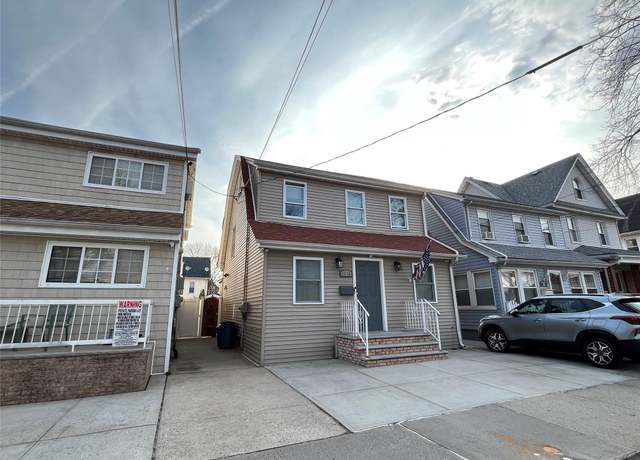 Property at 10719 96th St, Ozone Park, NY 11417, 3 beds, 2 baths