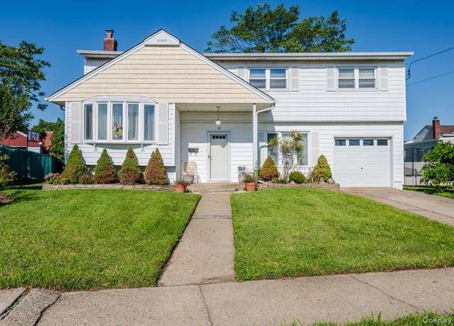 Property at 10 Meadow Rd, Inwood, NY 11096, 4 beds, 1.5 baths