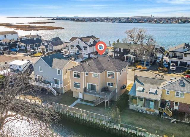 Property at 829 S Long Beach Ave, Freeport, NY 11520, 4 beds, 3.5 baths