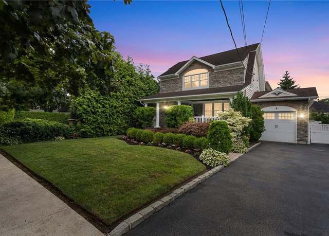 Property at 70 Reid Ave, Rockville Centre, NY 11570, 4 beds, 2.5 baths