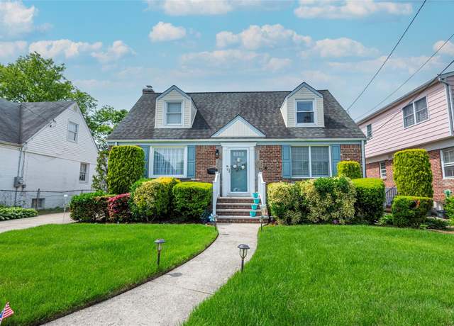 Property at 103 Woods Ave, Malverne, NY 11565, 4 beds, 2 baths