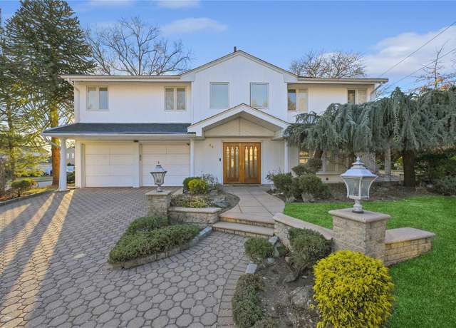 Property at 41 Cherrywood Dr, Manhasset Hills, NY 11040, 4 beds, 2.5 baths