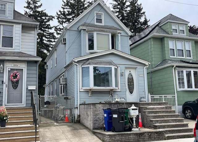 Property at 65-32 80 Ave, Glendale, NY 11385, 3 beds, 2 baths