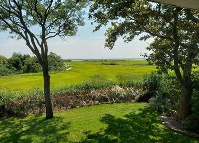 Property at 404 Club Ct, Oceanside, NY 11572, 4 beds, 2.5 baths