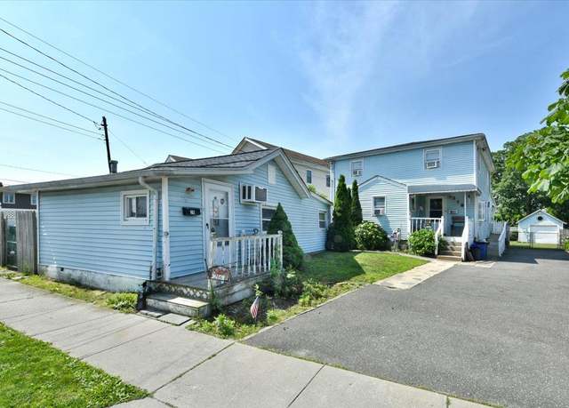Property at 218 Mott St, Oceanside, NY 11572, 4 beds, 3 baths