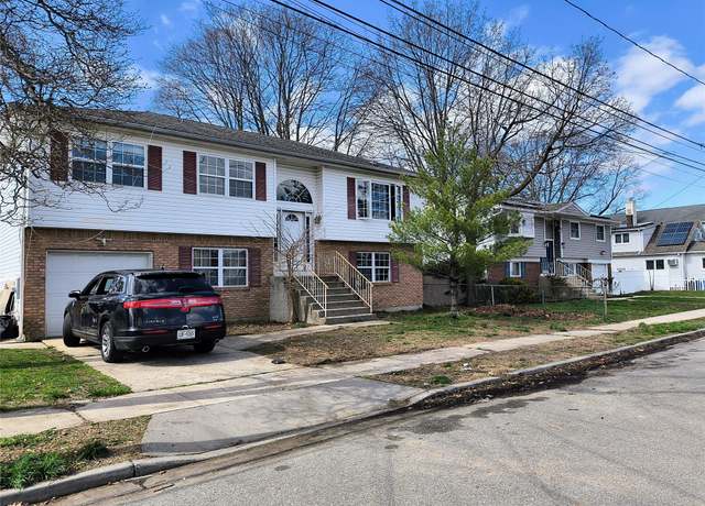 Property at 1056 E Arthur St, Uniondale, NY 11553, 6 beds, 3 baths