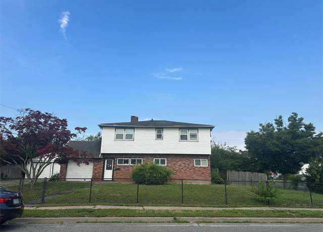 Property at 63 Grape Ln, Hicksville, NY 11801, 4 beds, 2 baths