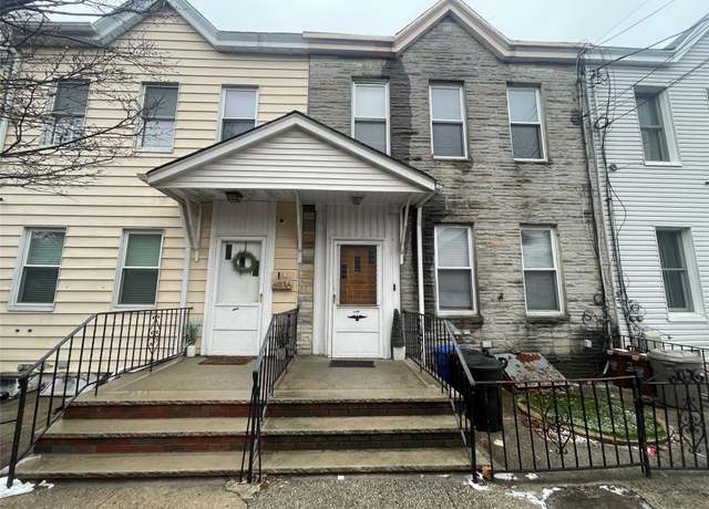 Property at 69-34 75 St, Middle Village, NY 11379, 3 beds, 2 baths