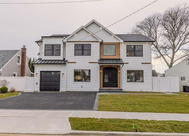 Property at 930 Winthrop Dr, East Meadow, NY 11554, 5 beds, 5.5 baths