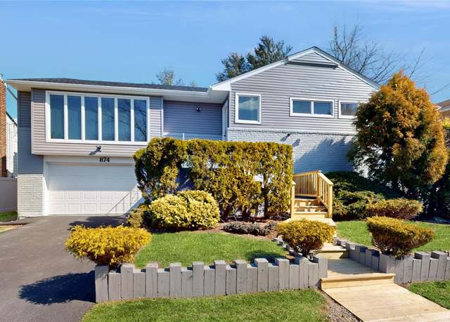 Property at 874 Woodmere Dr, North Woodmere, NY 11581, 5 beds, 3 baths