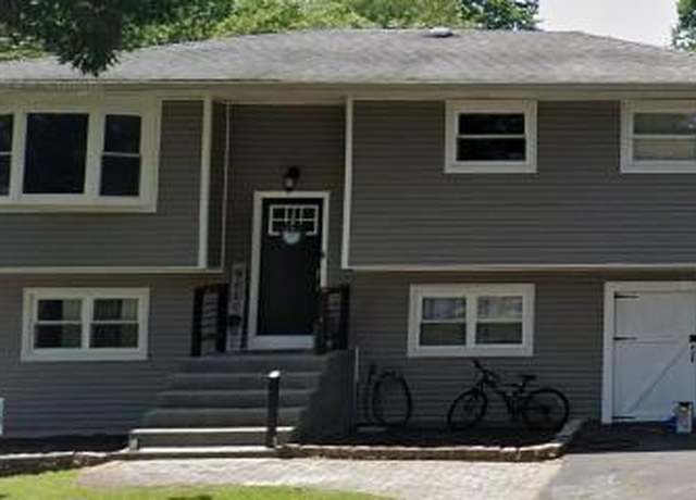 Property at 18 Burney Blvd, Mastic, NY 11950, 4 beds, 2 baths
