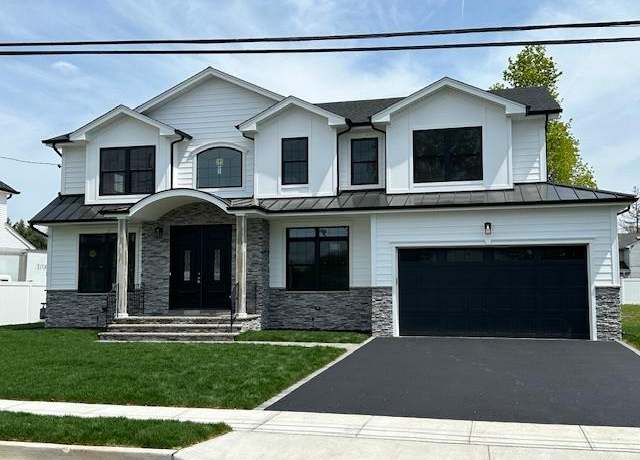 Property at 7 Walden Ave, Jericho, NY 11753, 5 beds, 4.5 baths