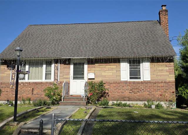 Property at 311 Travis Ave, Elmont, NY 11003, 4 beds, 2 baths