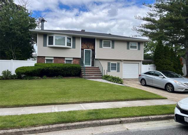 Property at 70 Pacific St, North Babylon, NY 11703, 4 beds, 2 baths