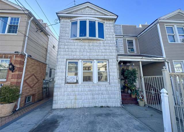 Property at 111-10 106th St, Ozone Park, NY 11417, 4 beds, 2 baths