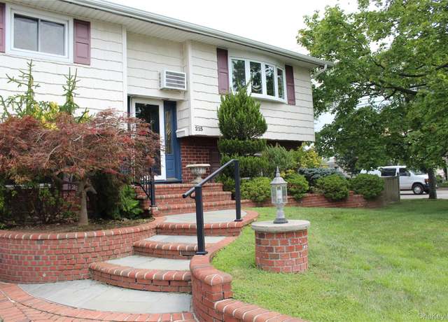 Property at 215 N Syracuse Ave, Massapequa, NY 11758, 5 beds, 2 baths