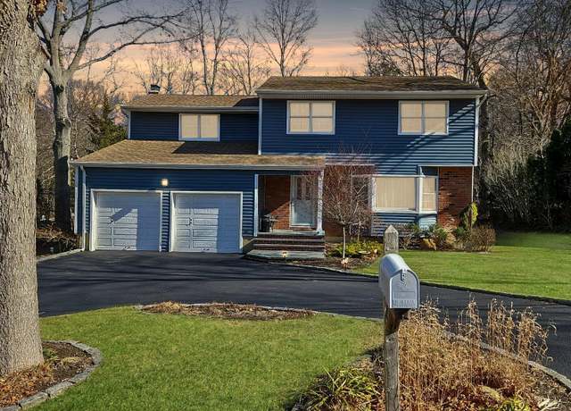 Property at 40 Winthrop Dr, Woodbury, NY 11797, 4 beds, 2.5 baths