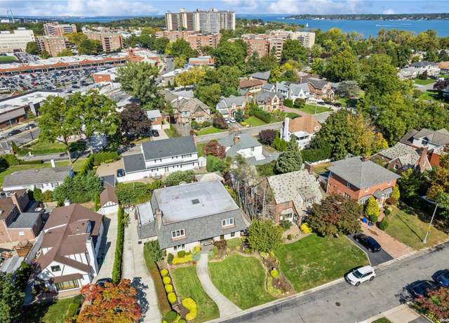 Property at 214-17 27th Ave, Bayside, NY 11360, 7 beds, 4.5 baths