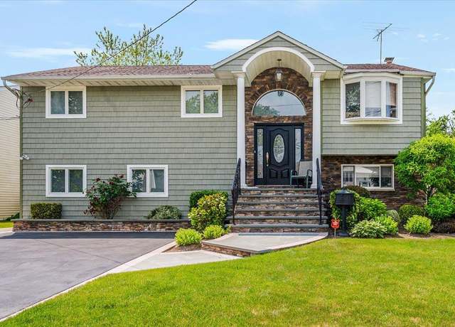 Property at 3316 Yost Blvd, Oceanside, NY 11572, 4 beds, 2.5 baths
