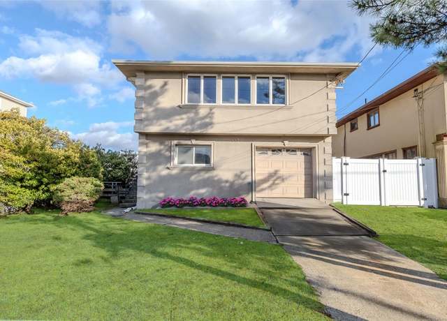 Property at 883 S Long Beach Ave, Freeport, NY 11520, 4 beds, 2 baths