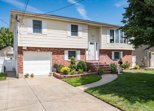 Property at 60 Vermont Ave, Oceanside, NY 11572, 4 beds, 2.5 baths