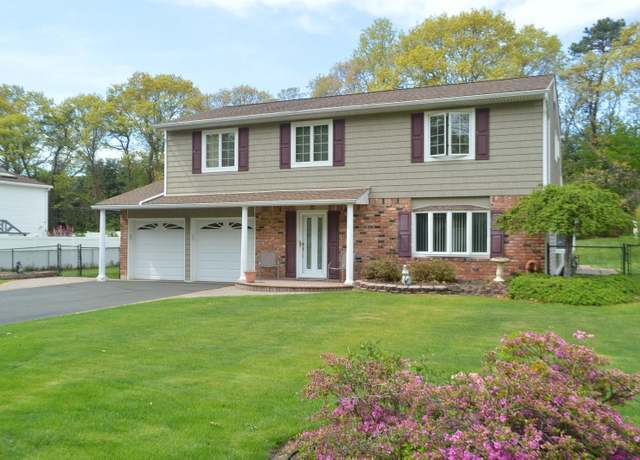 Property at 70 Fairfax Dr, Coram, NY 11727, 4 beds, 2.5 baths