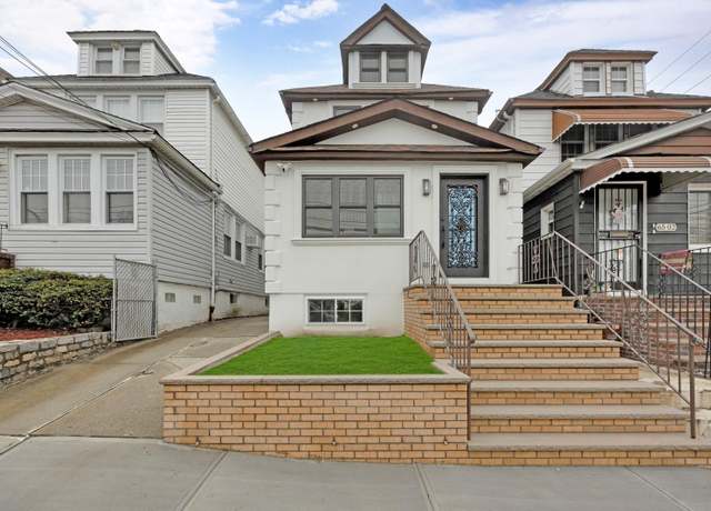 Property at 65-04 80th St, Middle Village, NY 11379, 3 beds, 3 baths