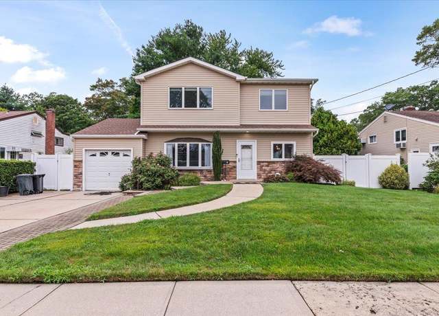 Property at 40 Woodland Ave, Farmingdale, NY 11735, 4 beds, 3 baths
