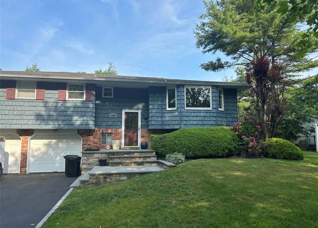Property at 18 Butterfield Dr, Greenlawn, NY 11740, 4 beds, 3 baths