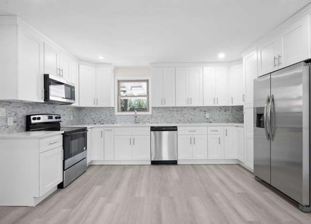 Property at 84 E 19th St, Huntington Station, NY 11746, 4 beds, 2 baths