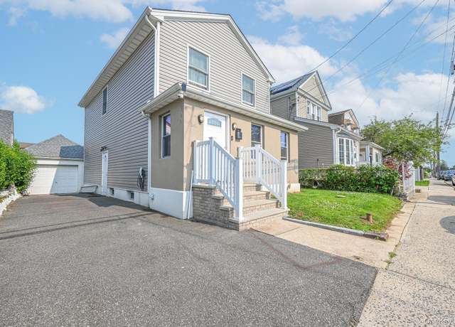 Property at 164 Biltmore Ave, Elmont, NY 11003, 4 beds, 3 baths
