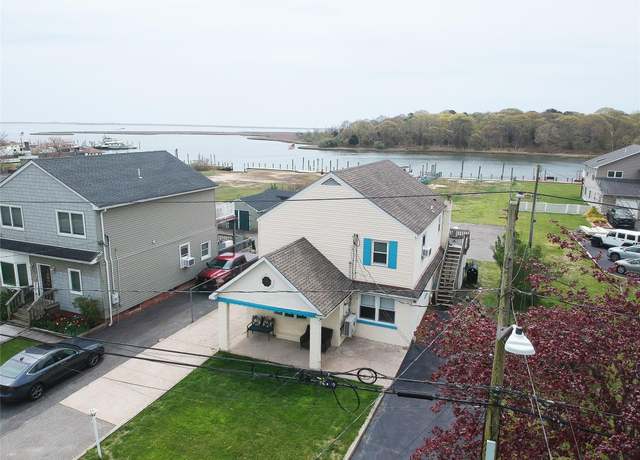 Property at 32 Shore Dr, Mastic Beach, NY 11951, 5 beds, 2 baths