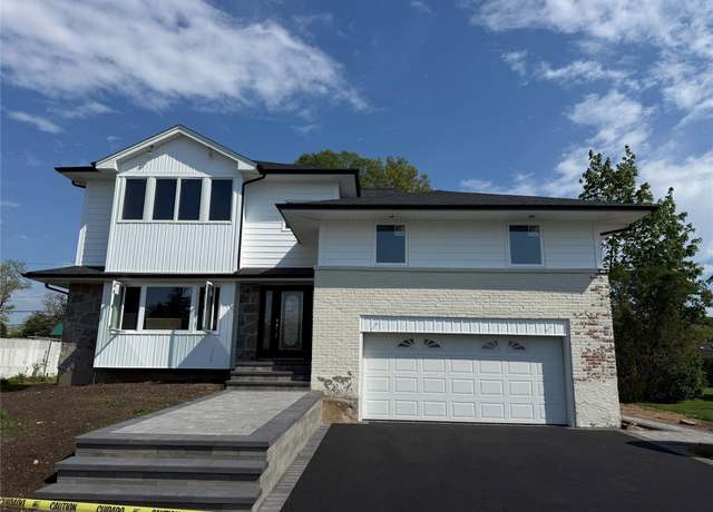 Property at 2040 Wellington Ct, Westbury, NY 11590, 4 beds, 3.5 baths